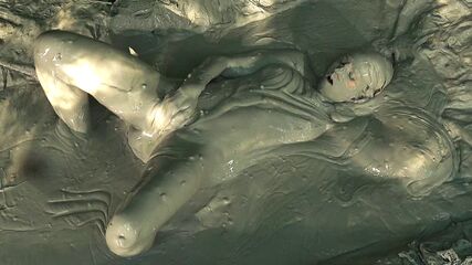 Hot Babe Gets Clay Wet
